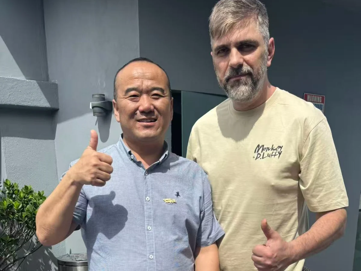 Supplier representative meeting an overseas customer during a potato ingredient cooperation follow-up